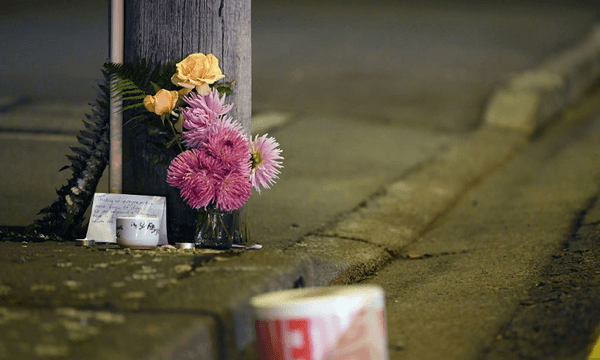 A floral tribute on Linwood Avenue near the Linwood Masjid following the terrorist attack in Christchurch (Photo: Kai Schwoerer/Getty Images) 
