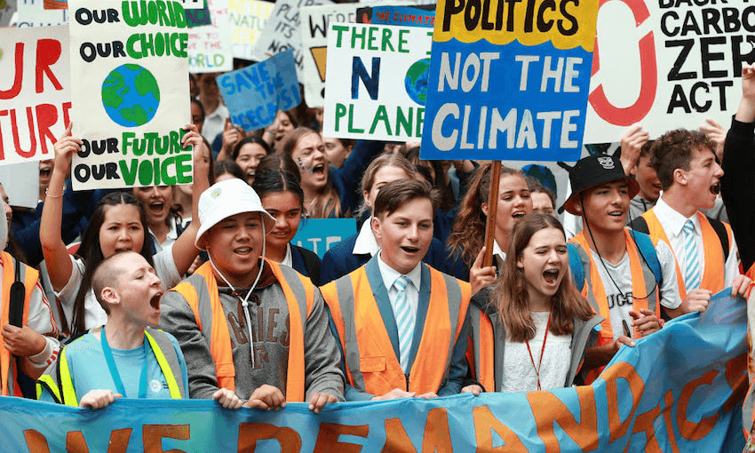 Students march through the streets of Wellington during the strike to raise climate crisis awareness (Photo by Hagen Hopkins/Getty Images) 
