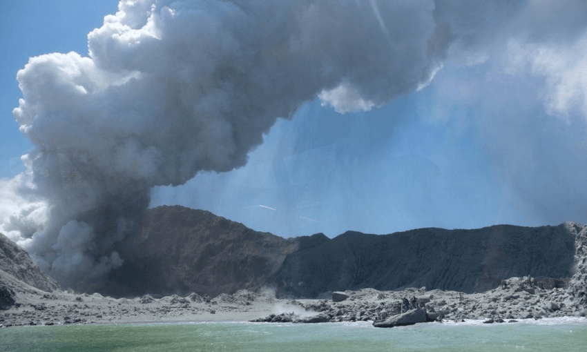 A view of the Whakaari eruption from a boat just off the island