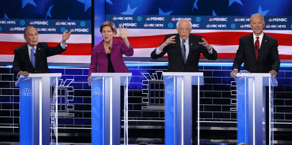 Democratic presidential candidates (L-R) former New York City Mayor Mike Bloomberg as Sen. Elizabeth Warren (D-MA), Sen. Bernie Sanders (I-VT) and former Vice President Joe Biden participate in the Democratic presidential primary debate at Paris Las Vegas on February 19, 2020 in Las Vegas, Nevada. (Photo by Mario Tama/Getty Images) 
