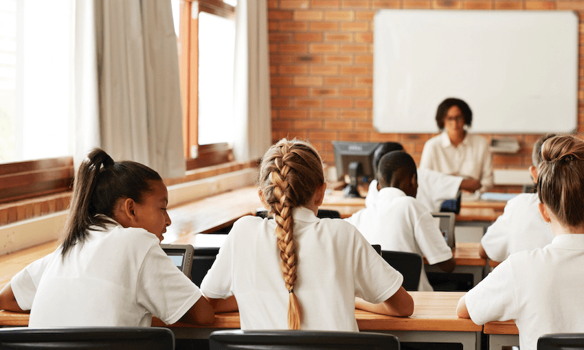 School students in class working with tablets