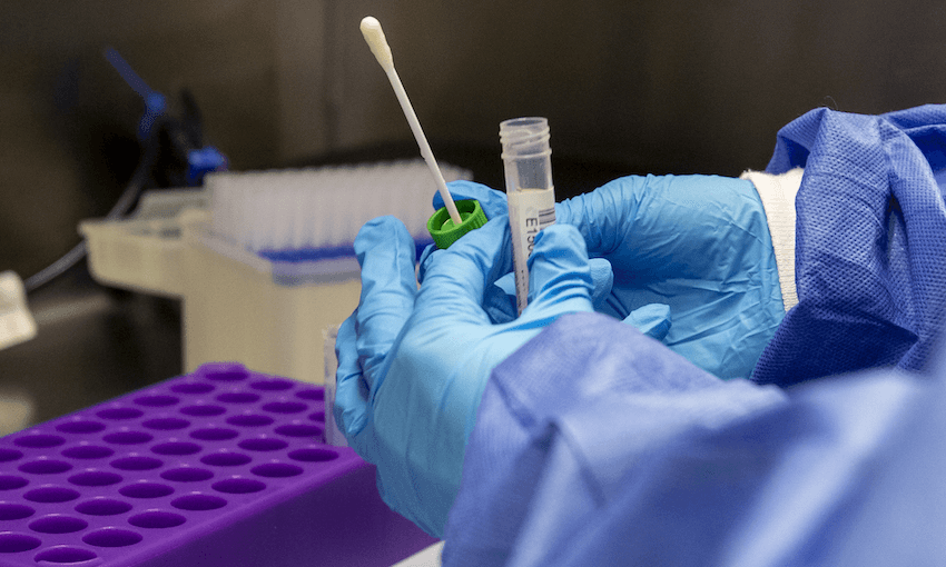 Covid-19 tests being prepared for analysis in the laboratory at Whiston Hospital in Merseyside, England (Photo: Peter Byrne/PA Images via Getty Images) 
